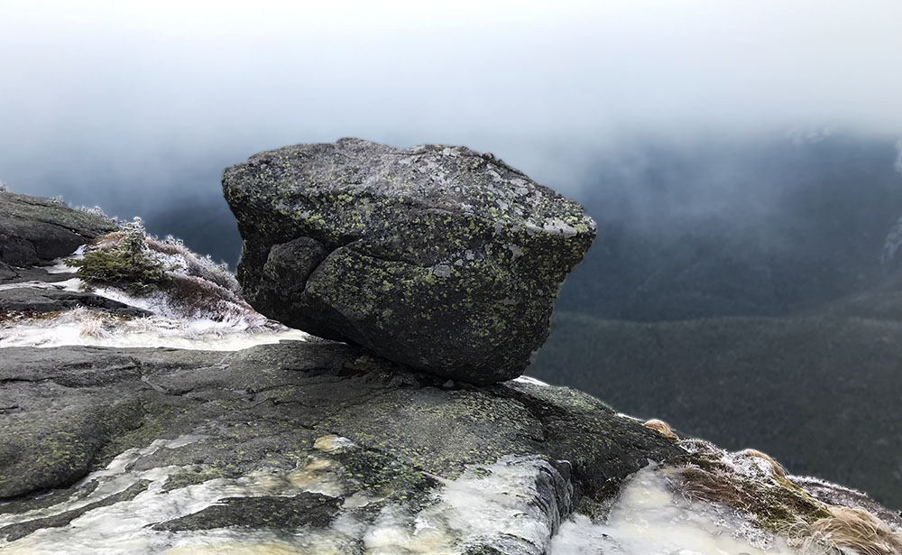 A bolder perched precariously atop Colden