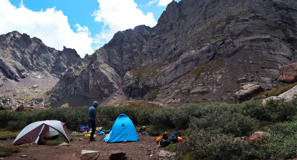 Setting up camp in the shadow of the Ellingwood Arete.