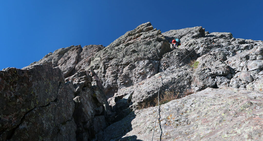 A steep pitch on the Ellingwood Arete. My guide belayed from above as I followed his line up the rock face.