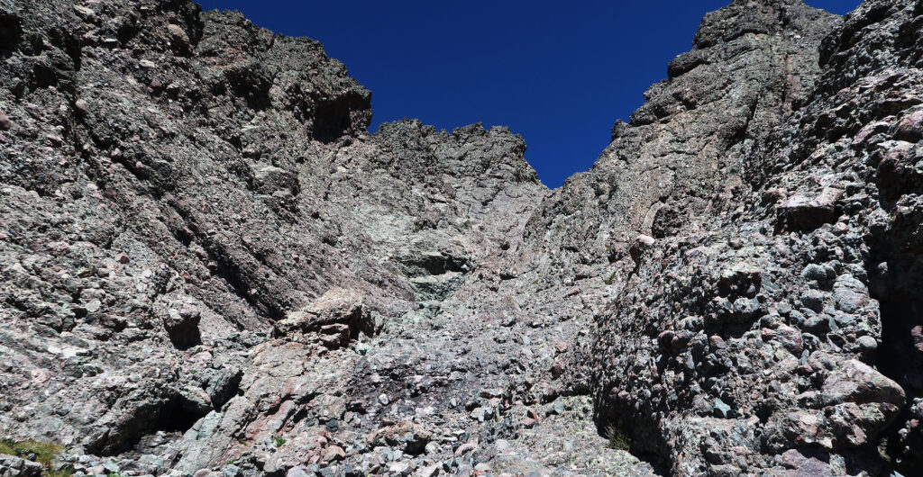 Steep gullies of Crestone composite on the Needle's standard route.