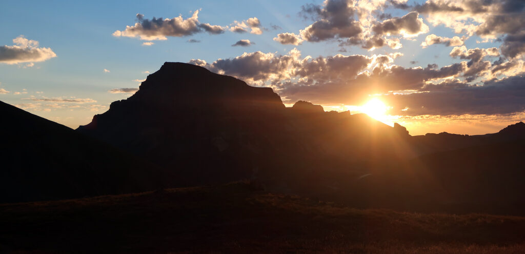 Uncompahgre Peak silhouetted against the morning sun.