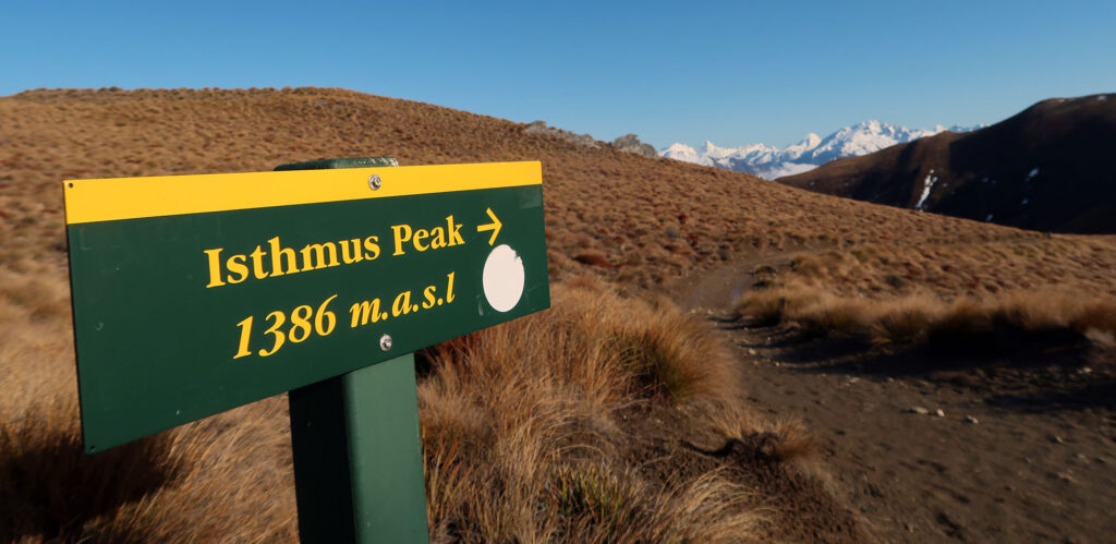 Signage for the summit along the Isthmus Peak Track.