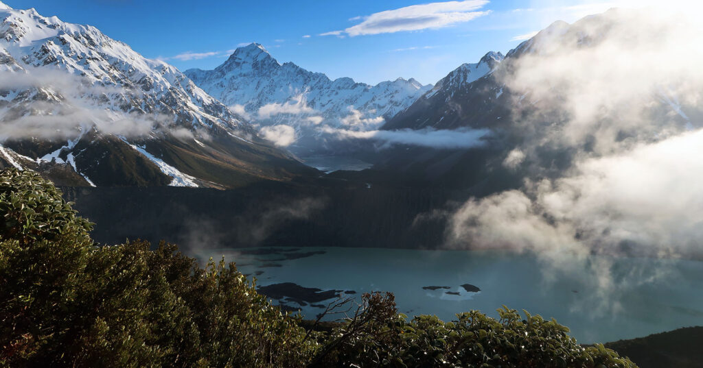 Morning clouds begin to roll into the Hooker Valley, seen from the Sealy Tarns Track.