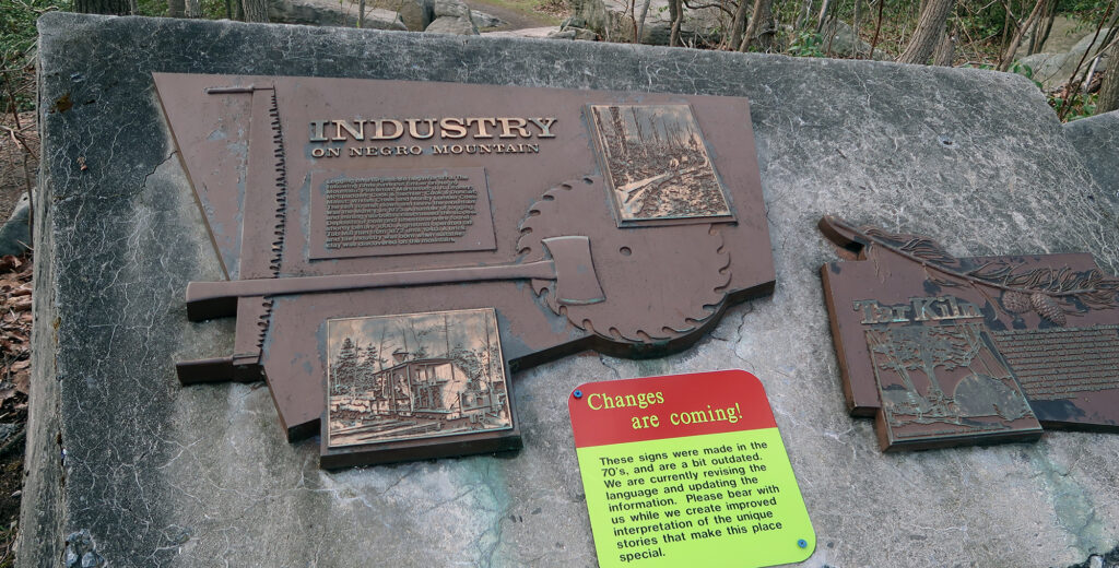 Interpretive signage reveals a controversial name for the ridgeline Mount Davis sits upon.