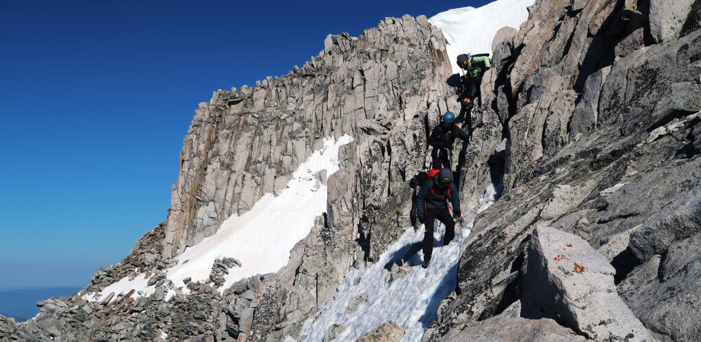 Scrambling down from Snowmass's summit.