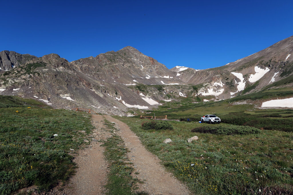 Father Dyer Peak looms over Lower Crystal Lake, with taller Crystal Peak visible behind it to the right.