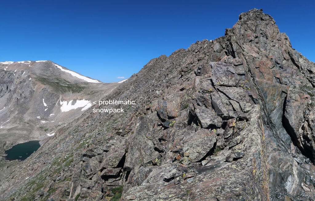 Lingering snowpack on the steepest section of my planned descent route. After spotting this, I planned to just turn around on the ridge's apex.