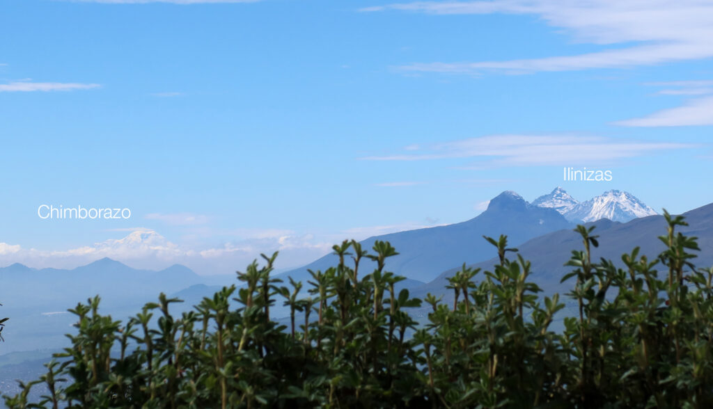Chimborazo, Ecuador's tallest summit, seen to the far South (surrounded by clouds).