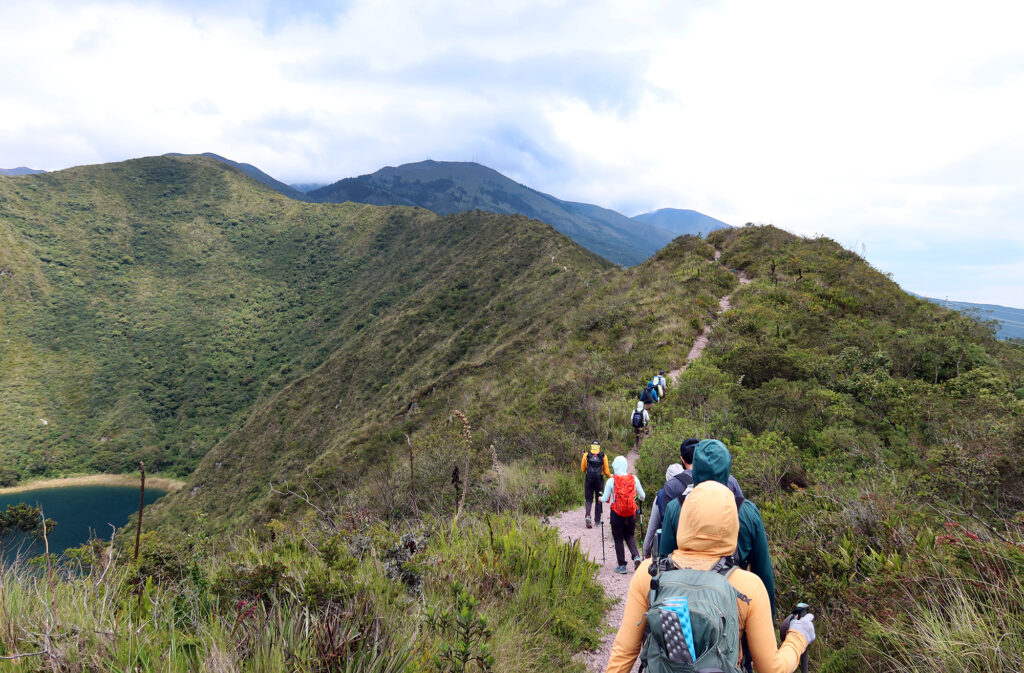 Hiking along the rim of the caldera that forms the lake.