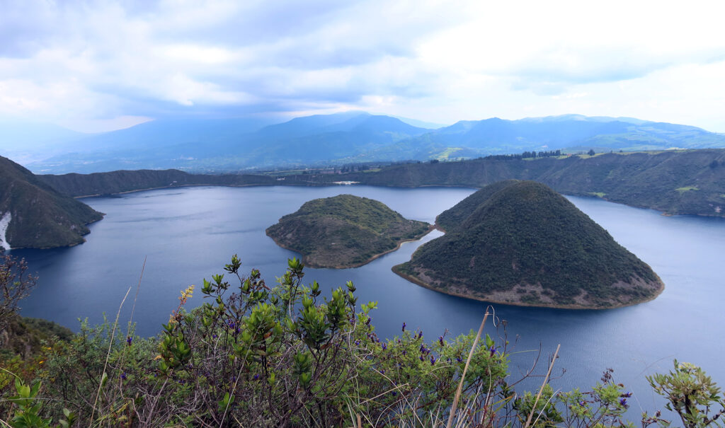 The two island of Cuicocha Lake, with a delightfully narrow straight between them. One theory of the lake's name is the larger island resembles a guinea pig—a local staple.