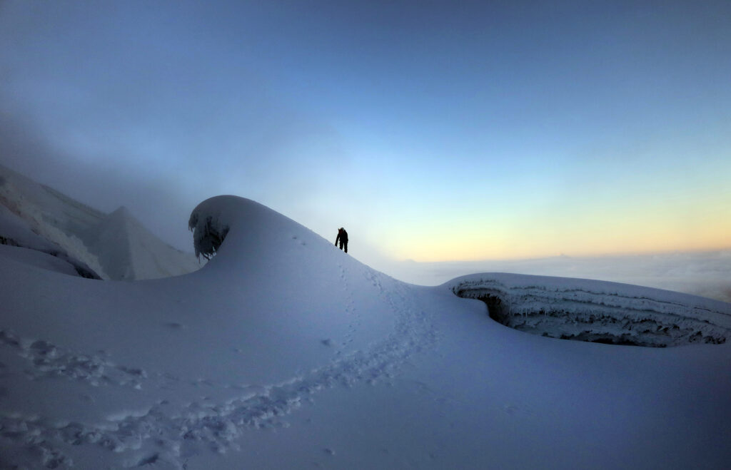 Ascending around a wave formation on the upper mountain.