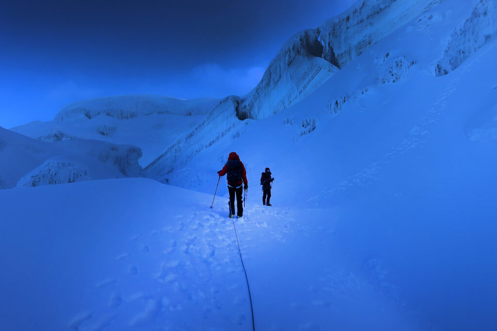 Approaching a steep climb on Cayambe, around sunrise.