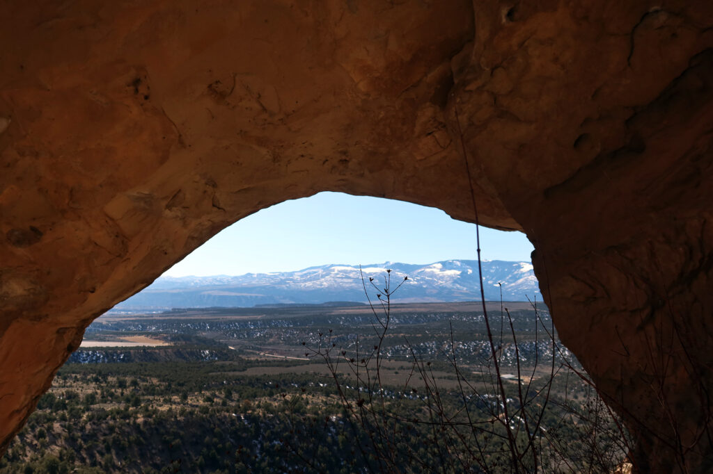 Snowy hills seen from behind Rifle Arch.