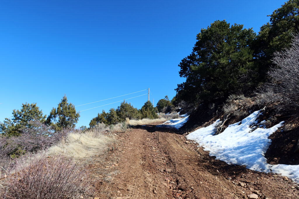 Muddy road early on the ascent.
