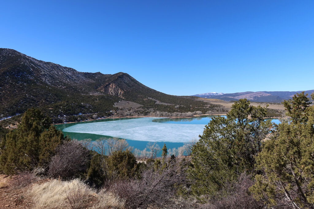 Views of the Grass Valley Reservoir, at Harvey Gap, from a couple hundred vertical feet up the jeep road.