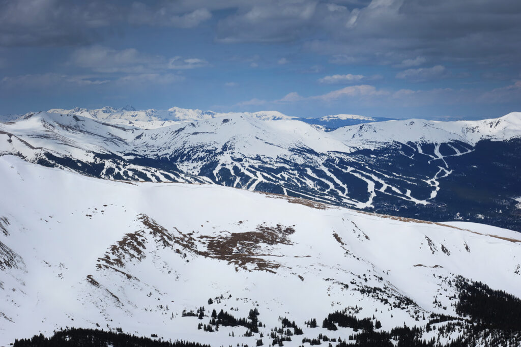 The slopes of nearby Bald Mountain (foreground) with Breckenridge and the Tenmile Range in the background.