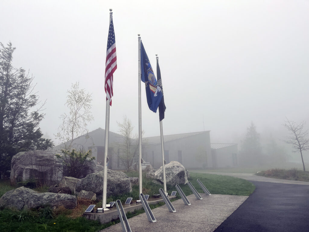 Flags and bike parking outside the visitor center.